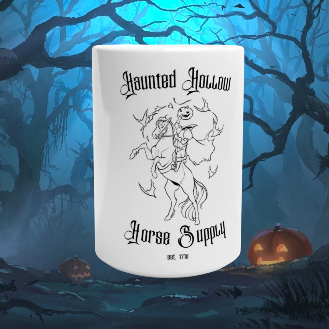 A white ceramic mug with the design "Haunted Hollow Horse Supply" printed on it with the headless horseman on a rearing horse.